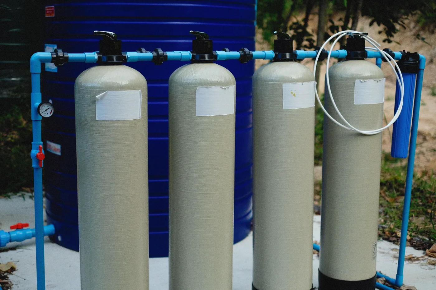 Commercial water-treatment tanks and distribution piping